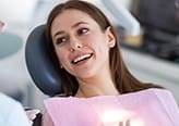 Smiling woman in dental chair